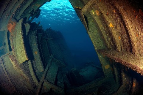 View through rusting hull of rusty shipwreck Elviscot, Mediterranean Sea, Elba, Tuscany, Italy,