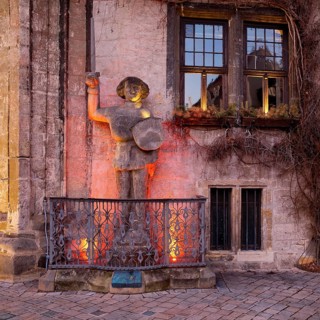 Illuminated Roland statue at the town hall at dusk, Quedlinburg, Saxony-Anhalt, Germany, Europe