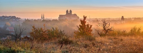 Panorama of Quedlinburg at sunrise, view of the castle hill with the collegiate church of St.