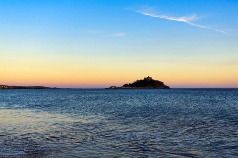 St Michael's Mount, tidal island with castle, evening sky, single cirrus, Marazion, Cornwall,