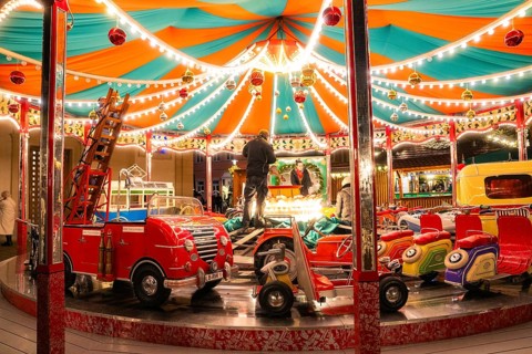 A colourful carousel with fairy lights in a lively night-time atmosphere, Ludwigsburg Christmas