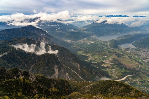 View from the summit of Mount Pizzo di Levico to the lakes in the Sugana Valley, Trentino, Italy,