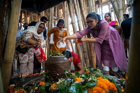 Devotees offer prayers to a Shiva linga on the occasion of Maha Shivaratri, on February 26, 2025 in