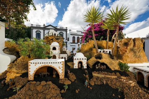 Christmas cot, white houses, palm trees, Cumulus, old town of Haria, Lanzarote, Canary Islands,