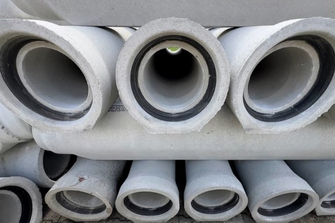 Stacked concrete pipes Sewer pipes for laying Pipe laying in road construction for sewage Rainwater