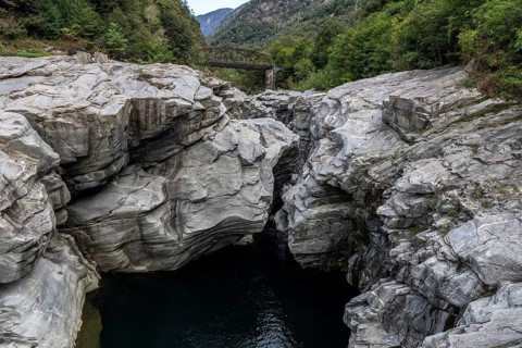 Rocks, granite rock formations in the Maggia River near Ponte Brolla, in the Maggia Valley, Valle