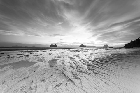 Structures in the sand, sunrise at low tide on the beach of Koh Ngai Island, Andaman Sea, Satun