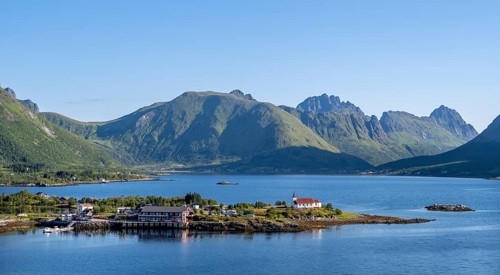 Place and small church Sildpollnes Kirke at the fjord Austnesfjorden, idyllic Norwegian fjord