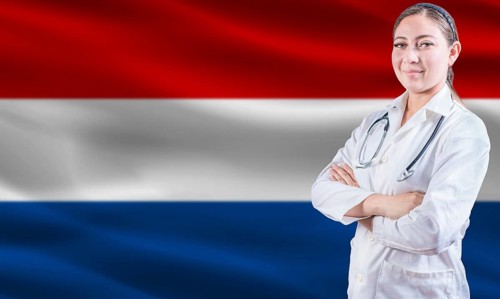 Female doctor on Dutch flag. Doctor with crossed arms on Dutch flag. Netherlands health and care
