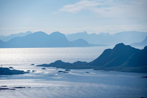 Mountain peak and fjord Austensfjorden, fjord landscape and sea, view from the summit of