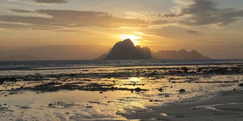 Structures in the sand, sunrise at low tide on the beach of Koh Ngai Island, Andaman Sea, Satun