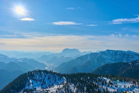 Snow-covered mountains under a clear blue sky with bright sunshine, Steinplatte, Waidring, Tyrol,