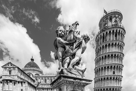 Statue with angels, behind the Cathedral of Santa Maria Assunta and the Leaning Tower, black and