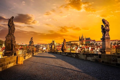 Charles bridge with statues and Prague castle on surise. Prague, Czech Republic, Europe