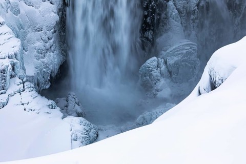 Dettifoss waterfall with icy and snow-covered rock face, Northern Iceland Eyestra, Iceland, Europe