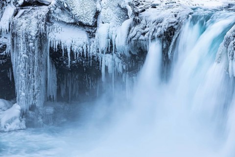 Godafoss waterfall, icy and snowy rock face, Northern Iceland Eyestra, Iceland, Europe
