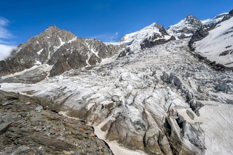 High alpine glaciated mountain landscape, La Jonction, Glacier des Bossons meets Glacier de