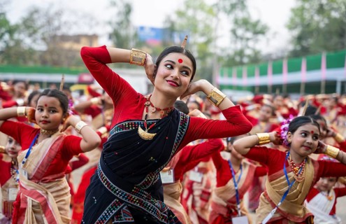 Participants with an instructor dance on the final day of a Bihu dance workshop ahead of Rongali