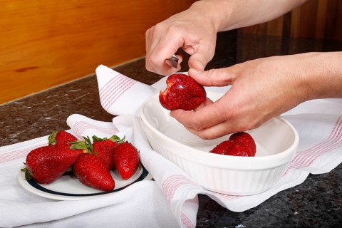 Swabian cuisine, preparation of filled pancakes, Flädle with strawberry jam and icing sugar, Gsälz,