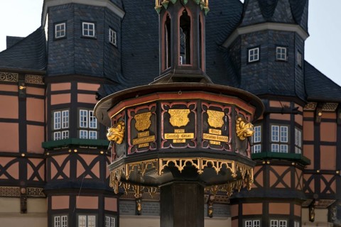 Benefactors' fountain with the town hall, Wernigerode, Harz, Saxony-Anhalt, Germany, Europe