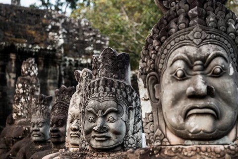 Figures on the bridge to Angkor Thom, sunset, Angkor Wat, Angkor, UNESCO World Heritage Site, Siem