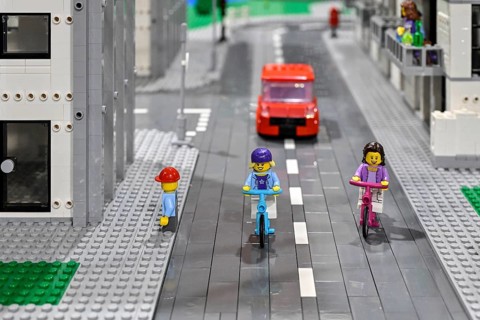 Lego figure with bicycle