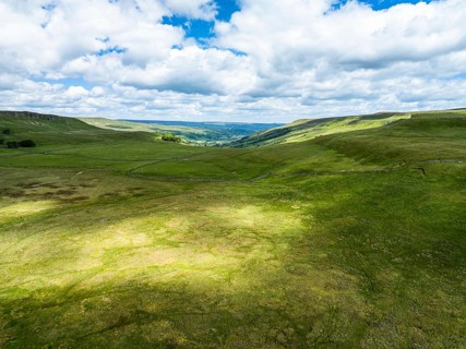 Meadows and Hills over Wharfedale from a drone, Cray, Skipton, Yorkshire Dales, North Yorkshire,