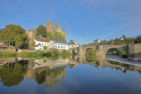 Old Lahn bridge built 1448 with castle built 12th century, Lahn valley, reflection, historic stone