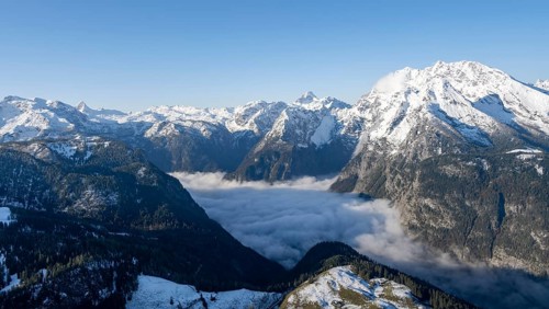 View of sea of clouds and snow-covered mountains, mountain panorama with Watzmann, from the Jenner,