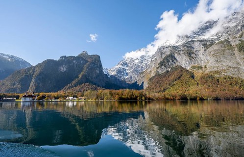 Königssee with Watzmann massif and pilgrimage church of St. Bartholomä, autumnal mountain landscape