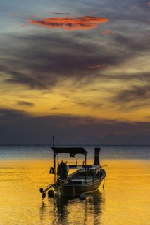 Longtail boat in sunset, sunset, horizon, evening light, boat, sun, evening mood, cloudy sky,