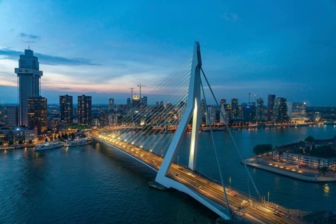 The skyline of Rotterdam, with the Erasmus Bridge over the Nieuwe Maas, Netherlands
