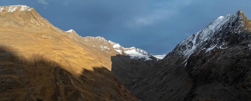 Mountain landscape in the evening light, mountain peak of the Niedertal in autumn, aerial view,