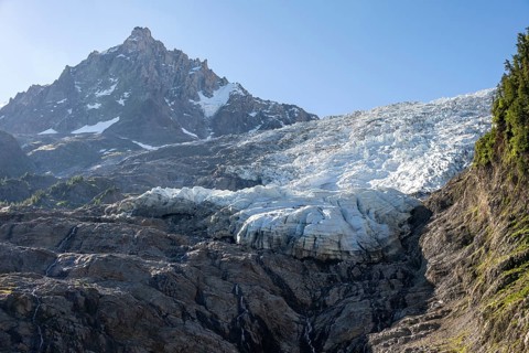 Impressive mountain landscape with glacier, glacier tongue of the Glacier des Bossons and summit of