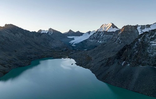 Mountain panorama, aerial view, 4000 metre peak with glacier, mountain pass and mountain lake