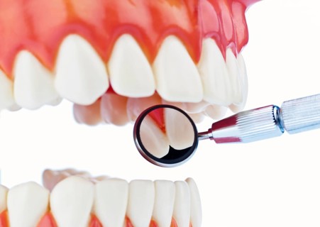 A set of teeth is examined, dental laboratory, dental technician, dentist, studio