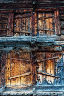 Weathered loading doors of an old hay barn, Grimentz, Val d'Anniviers, Valais Alps, Canton Valais,
