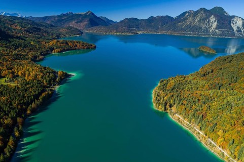Aerial view of a mountain lake and autumnal coloured trees in the morning light, Walchensee, view