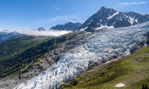 Mountain landscape with glacier Glacier des Bossons and summit of the Aiguille du Midi, Chamonix,