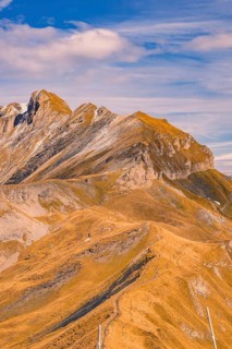 Mountain ridge with paths in warm autumn tones, Planplatten, Switzerland, Europe