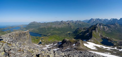 View of mountains and fjord landscape, mountain panorama, at the summit of Rundfjellet, lake