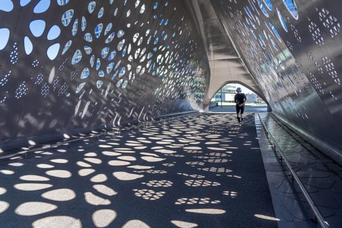 Light effects from the sun in the Parkbruk, a cycle and pedestrian bridge in the city centre of