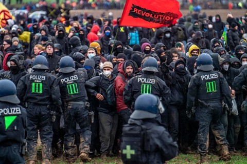 Violent clashes between thousands of demonstrators and the police, after a demonstration against