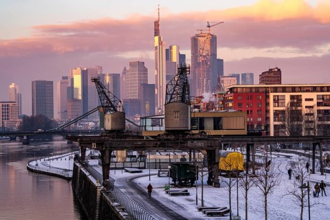 The skyline of Frankfurt am Main, skyscrapers of the banking district, historic harbour cranes at