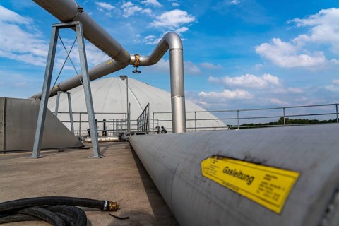 Biogas plant, gas storage, with dome, use of solid manure as energy source, gas pipelines, on a