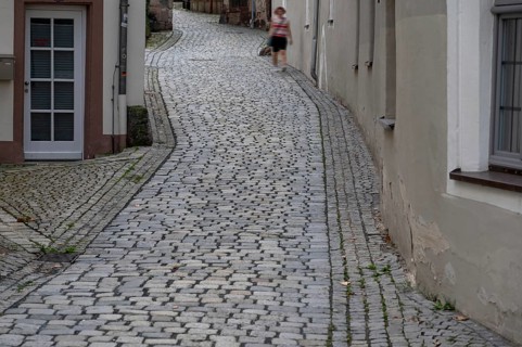 Street paved with basalt stones in the old town centre, Kulmbach, Upper Franconia, Bavaria,