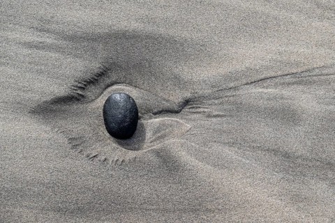 Lava pebbles on the beach, Playa de Famara, Lanzarote, Canary Islands, Spain, Europe