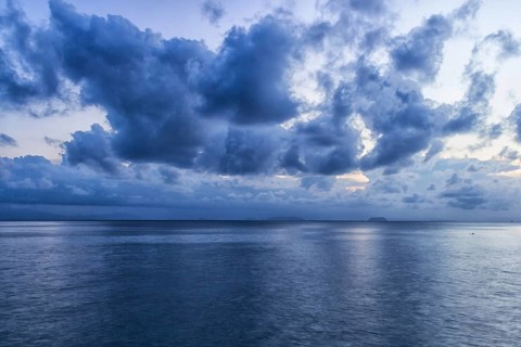 Sky with blue storm clouds over the sea in the marine reserve. Malaysia