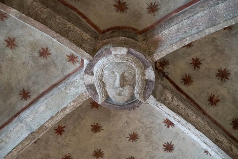 Head of Christ, in the cross-ribbed vault, chancel of the Romanesque St Michael's Church,