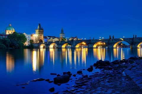 Charles Bridge (Karluv Most) on the Vltava River and Old Town Bridge Tower, at night, Prague, Czech
